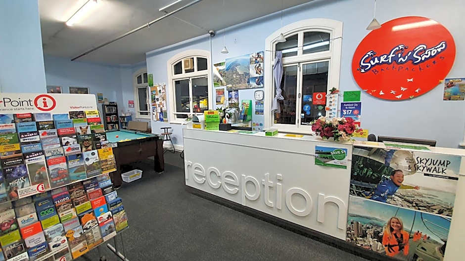 Surf 'N' Snow Backpackers Across Sky Tower