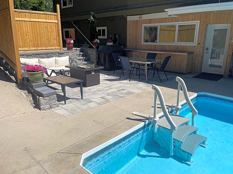 Bright poolside walkout two bedroom basement suite in the Okanagan