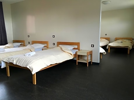 Single Bed in Dormitory Room