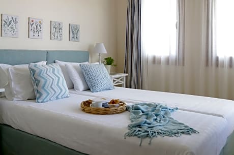 TWO BEDROOM SUITE WITH POOL VIEW