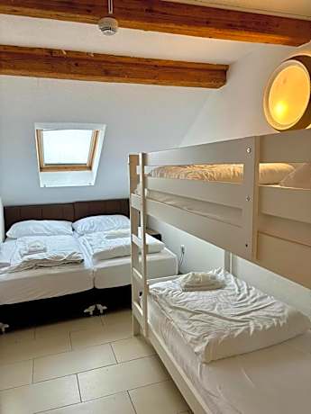 Quadruple Room with Shared Bathroom