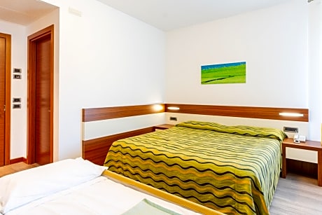 Family Room with 1 Extra Bed (2 Adults + 1 Child)