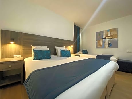 Triple Room (1 Double Bed + 1 Single Bed)