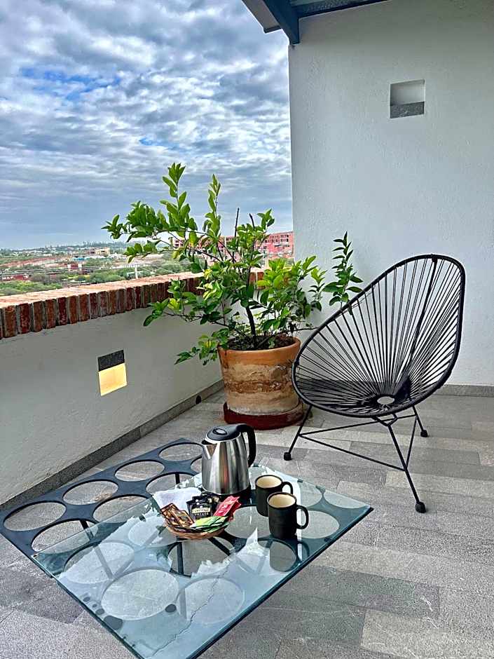 Departamento en planta baja con patio, dos habitaciones con dos ba¿os completos sala y cocina integral Vistas desde la azotea de