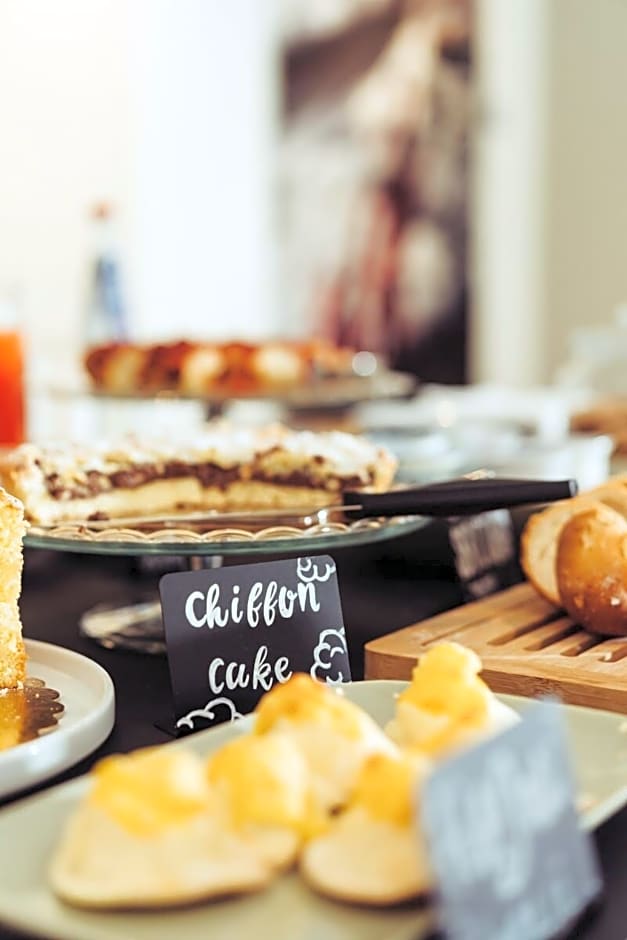 Marina Gardens Boutique & Suites