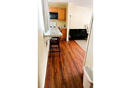 Premium Queen Bed with Kitchenette
