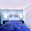 Bluebird Day Inn & Suites