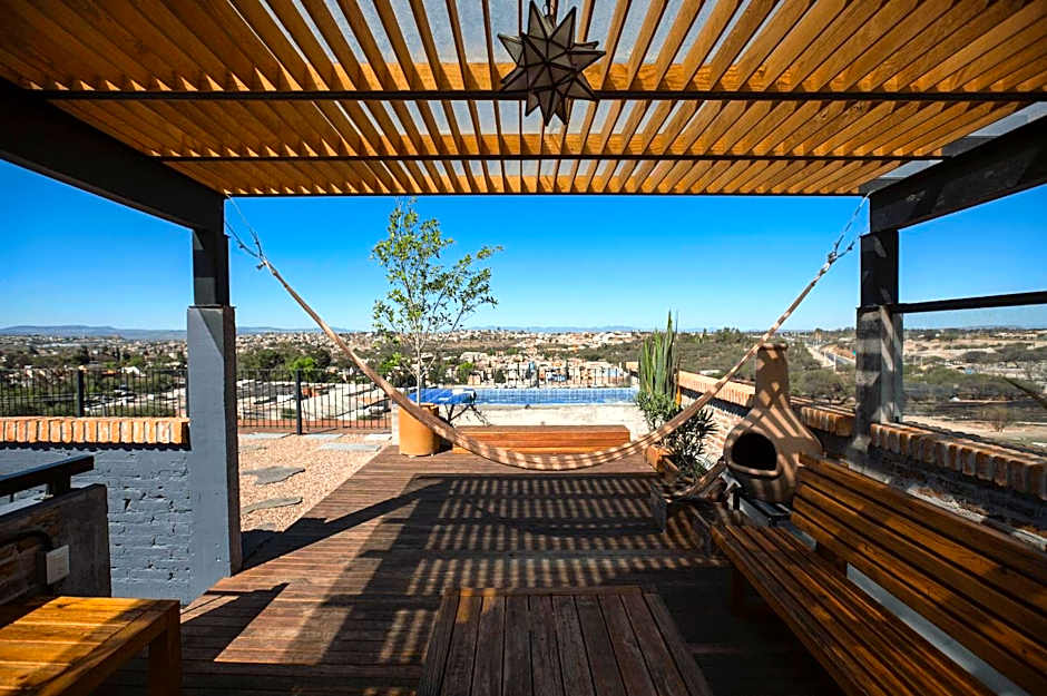Departamento en planta baja con patio, dos habitaciones con dos ba¿os completos sala y cocina integral Vistas desde la azotea de