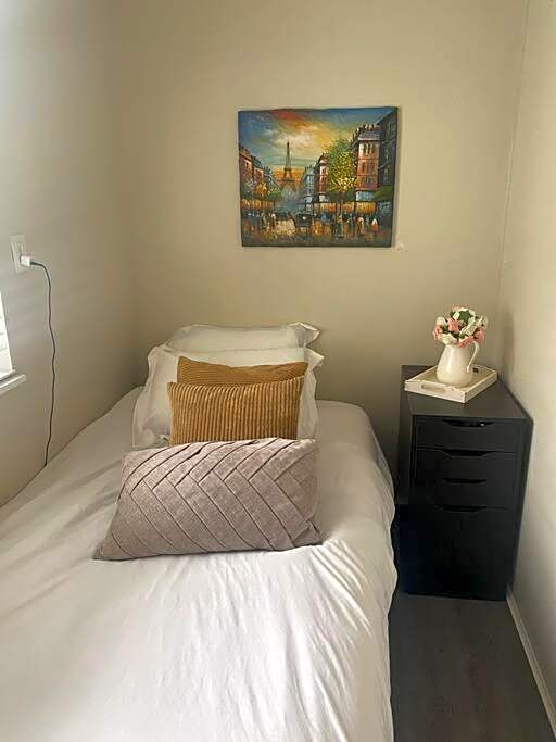 Room in an upper level 4 bedroom-1bathroom home on a quiet tree lined street