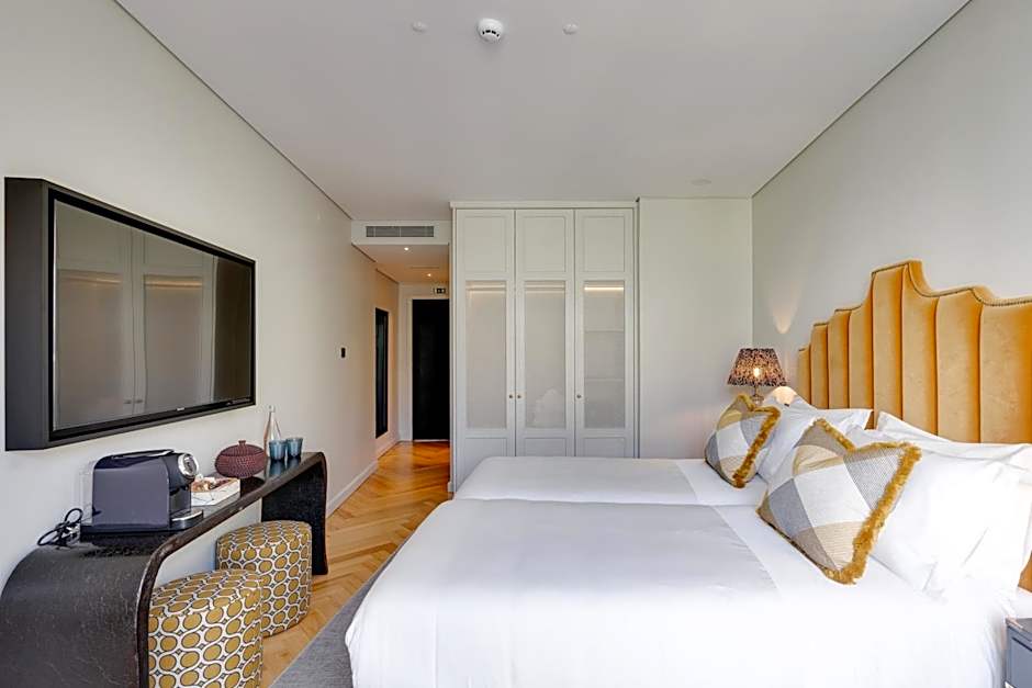 Portie Deluxe Suites by DA'HOME