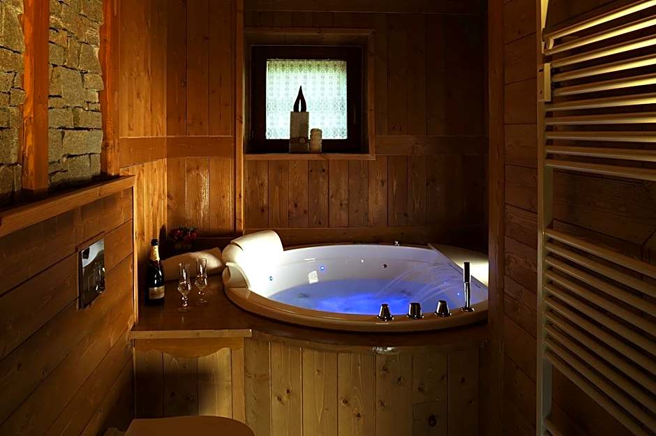 Aparthotel Foyer d'antan SUITE con caminetto hammam o vasca idromassaggio