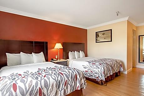 Suite with Two King Beds Fireplace and Spa Bath Non-Smoking