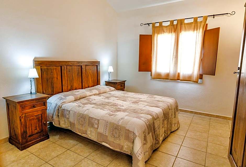 Residence with swimming-pool in Badesi, apartments with private outdoor area