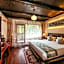 Yangshuo Tea Cozy-Free one way pick up service over 4 nights, English speaking, Yulong river location,Laundry service,Swimming pool, Bicycle rent