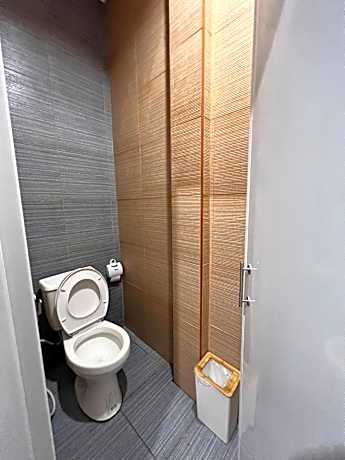 Single Bed in Dormitory Room