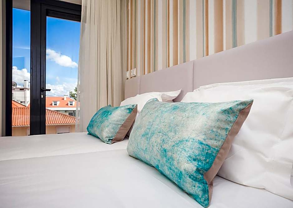 Essence Inn Marianos Hotel