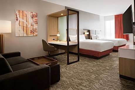 Suite with Two Queen Beds and a sofa