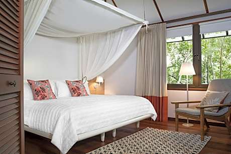 Coconut Bungalow Suite, Guest room, 1 King, Garden view, Terrace