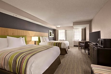Premium Queen Room with Two Queen Beds and Balcony - Non-Smoking