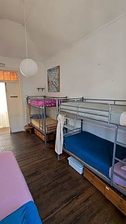 Single Bed in Dormitory Room