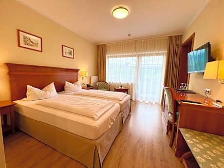 Family Room with Balcony or Terrace