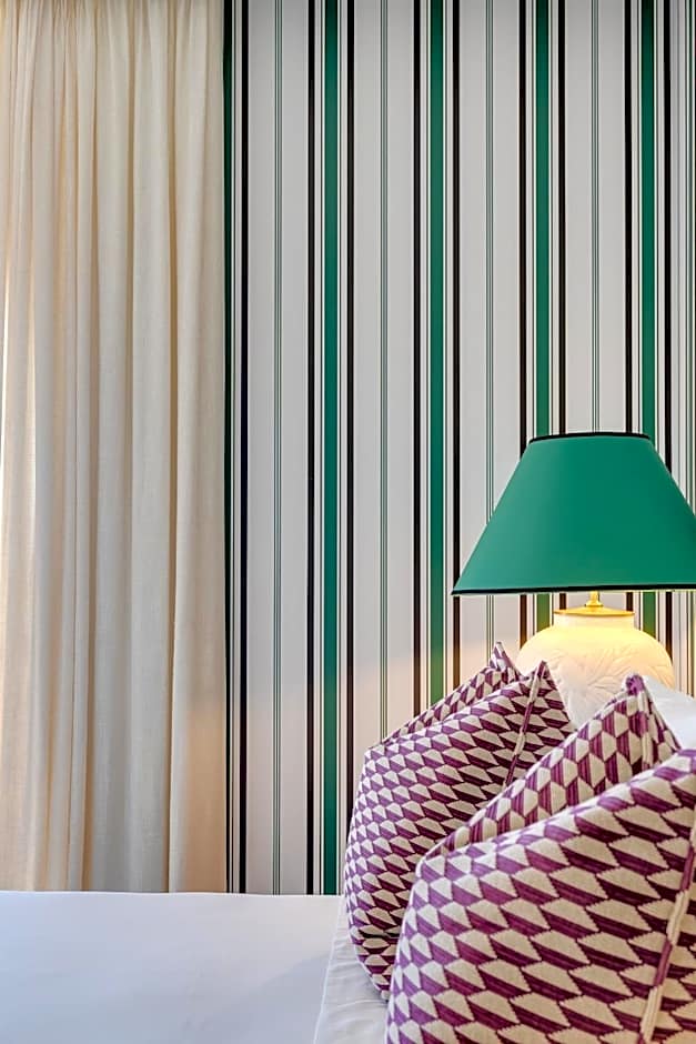 Portie Deluxe Suites by DA'HOME