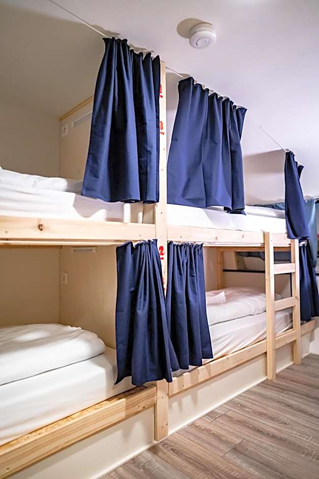 Photo 1 sur 7 de Bed in 4-Bed Dormitory Room