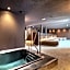 Aparthotel Familiaris - Family Apartments - Pools & Spa in Dolomites