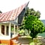 Tuk Tuk Timbul Bungalows