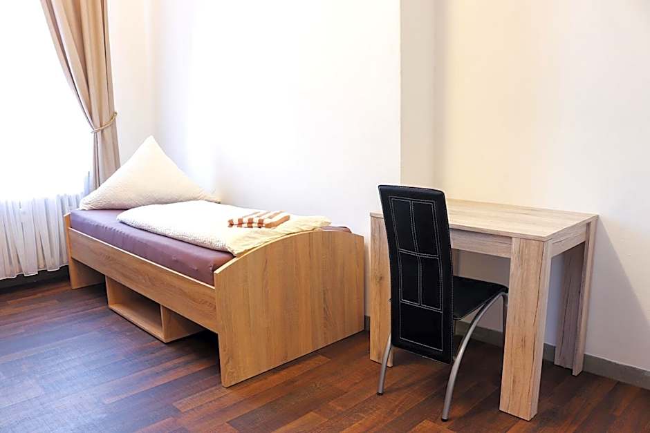 Photo 1 of 4 of Triple Room with Shared Bathroom