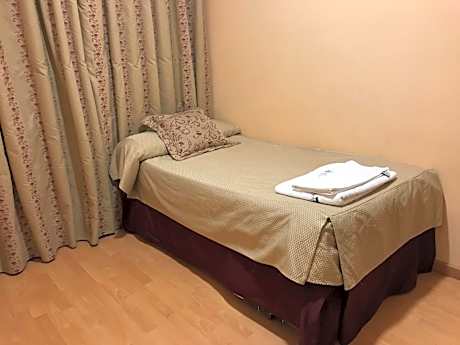 Triple Room (2 adults + 1 child up to 12 years old)