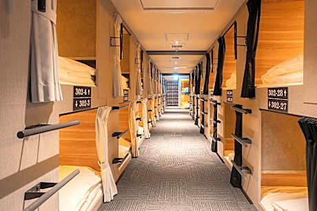 Capsule with Shared Bathroom