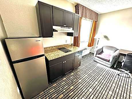 1 Queen Bed  Non-Smoking Kitchenette Flat Screen Television Desk High Speed Internet Access Full Bre