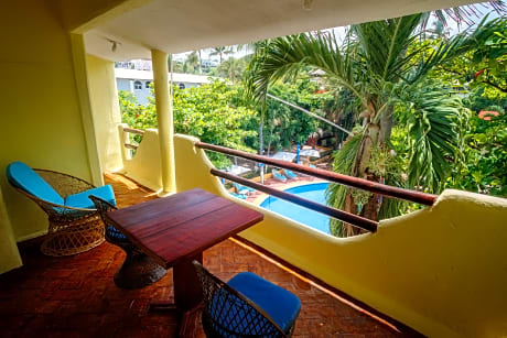 garden view room with kitchnette, a/c, fridge and