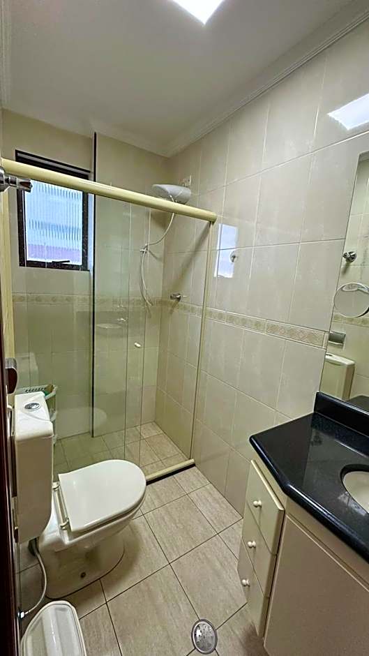 Belo apartamento de frente ao mar - Vila Caiçara