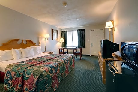 Comfortable Guest Room With 1 King Bed. Smoking Permitted.