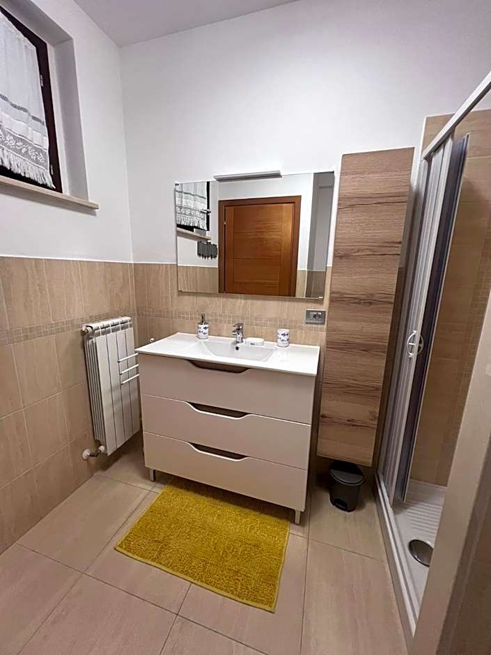 Casa Antia, nuovo bilocale con giardino in Residence con piscina
