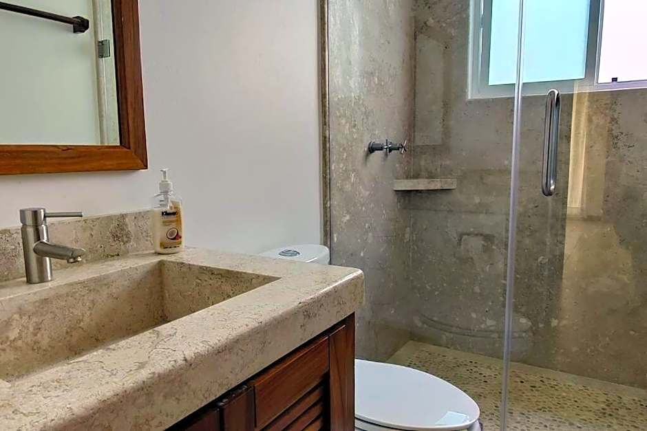 Apartment Tortugas- rooms with AC, and great pool at 5 min to Carrizalillo beach and restaurants of Benito Juarez Bulevard