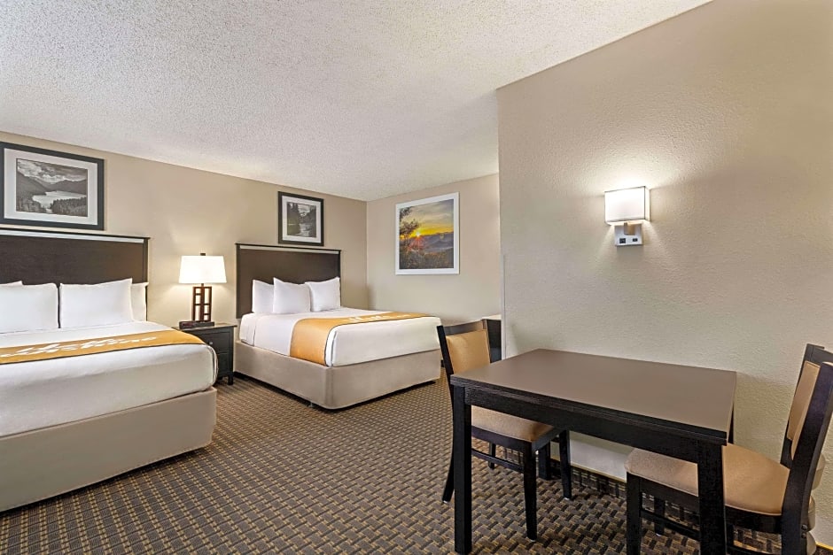 Photo 1 of 3 of 1 Queen Bed and 2 Double Beds Suite
