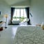 White Wall Riverfront Hotel