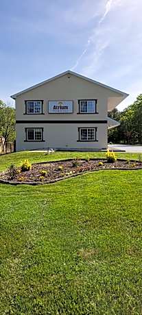 Atrium Inn & Suites