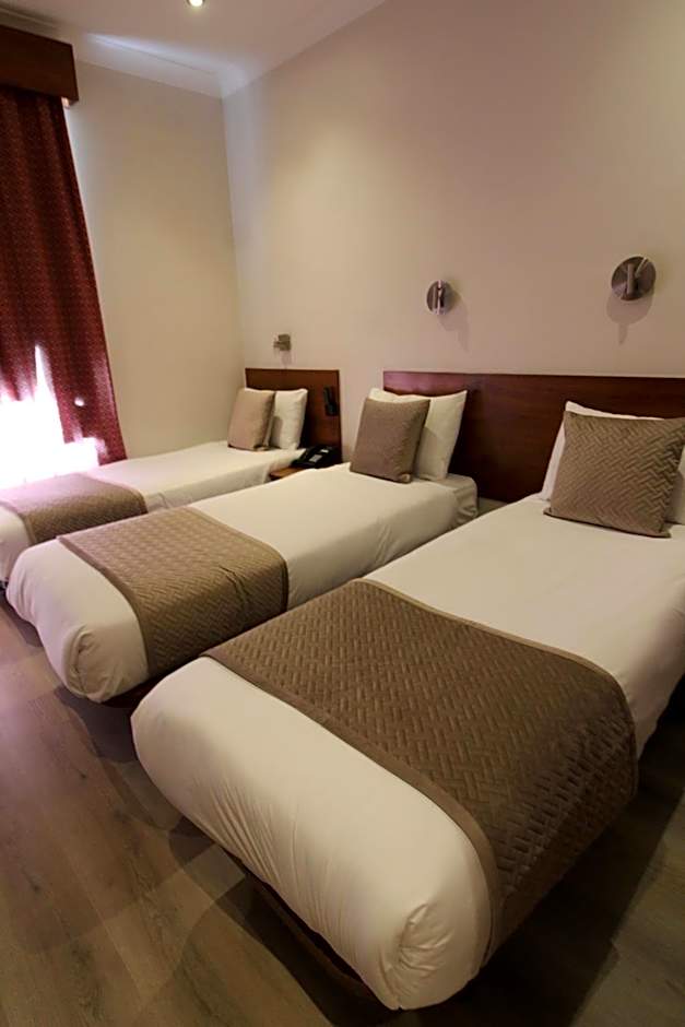 Photo 1 of 7 of Triple Room