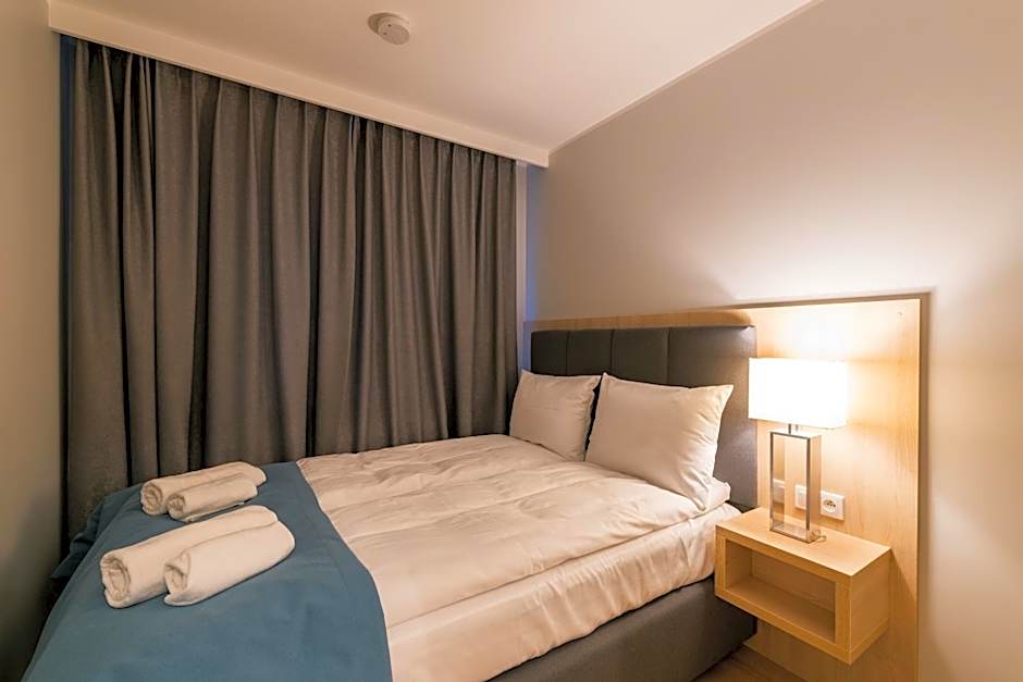 Q17 Apartments Rynek