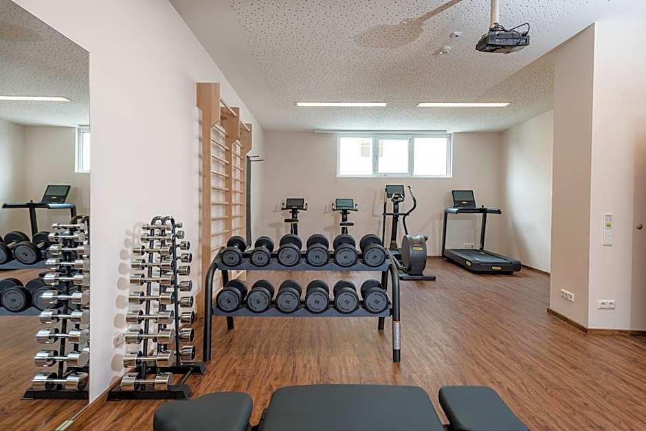 Hotel Norica - Thermenhotels Gastein mit dem Bademantel direkt in die Therme