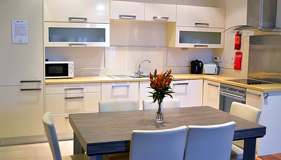 Carrick Plaza Suites and Apartments