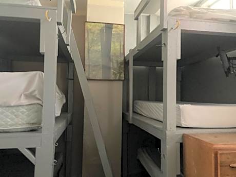 Single Bed in Dormitory Room