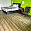 Zainee Inc Budgetel Inn and Suites