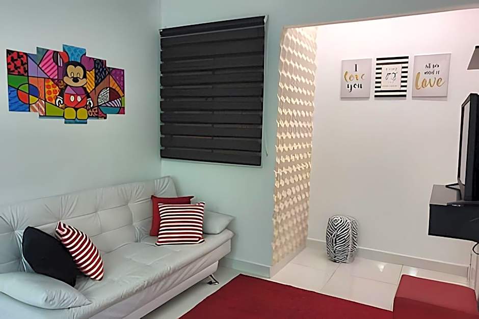 Apartamentos aconchegantes frente mar