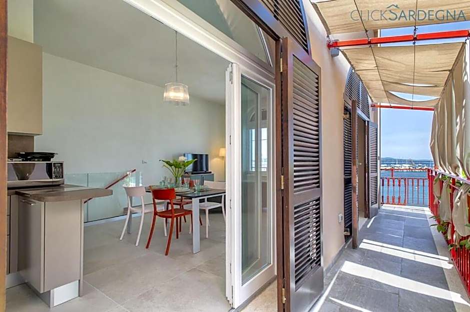 ClickSardinia Alghero Spectacular waterfront Neptune apartment with sea-facing terraces and garden