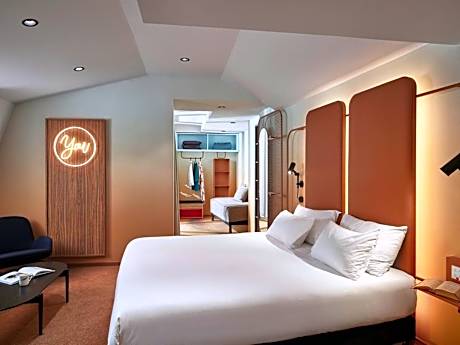 Deluxe Junior Suite with One Double Bed and Two Single Beds and Terrace